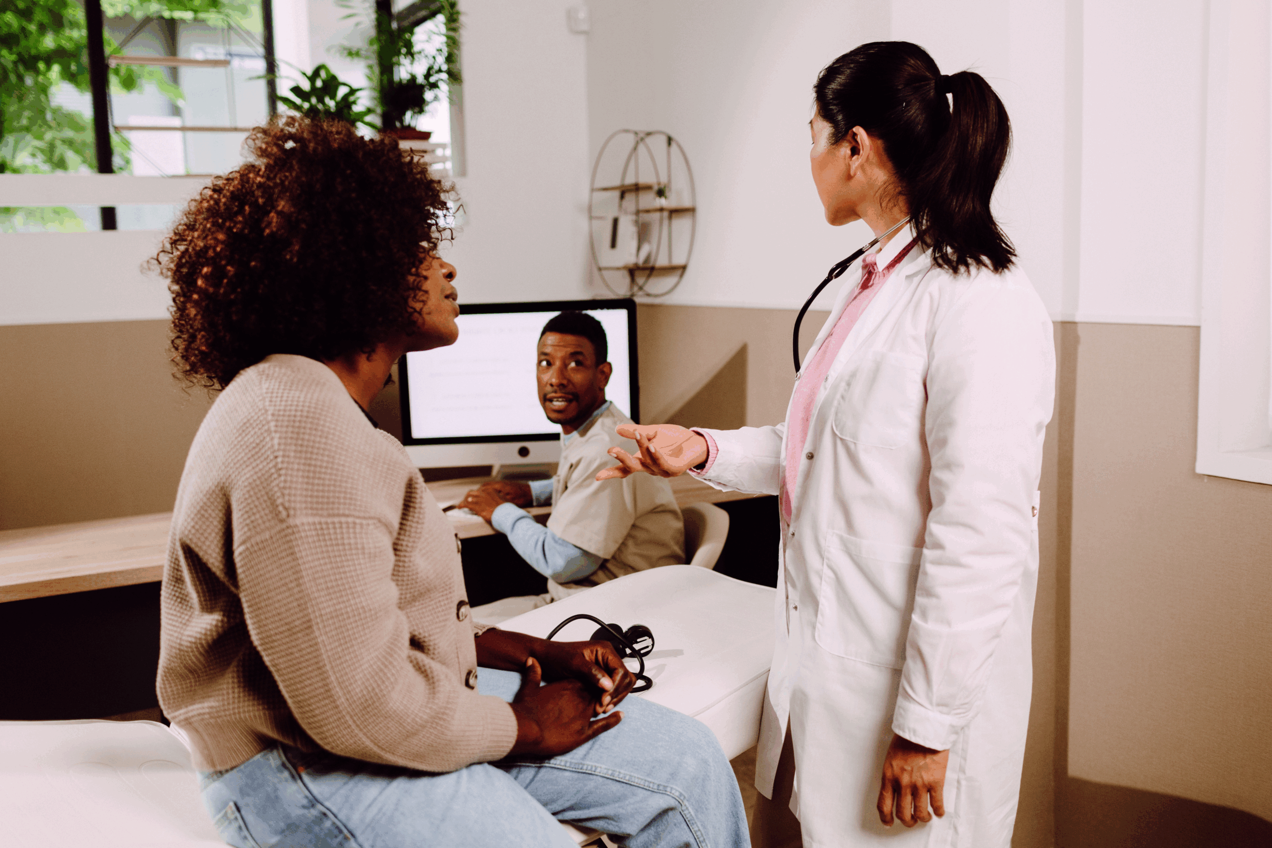 woman speaking with doctor